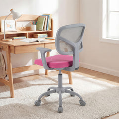 The kids desk chair is positioned next to a wooden desk in a child's bedroom