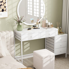 The office desk styled as a dressing table with a mirror and beauty products
