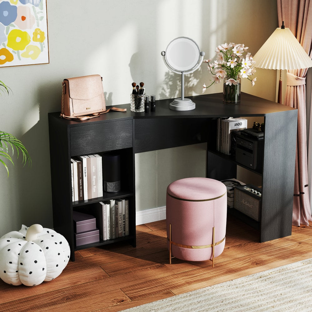 The corner computer desk with storage, styled as a dressing table with a mirror and stool