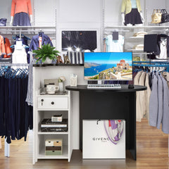 The reception counter desk set up in a retail clothing store environment