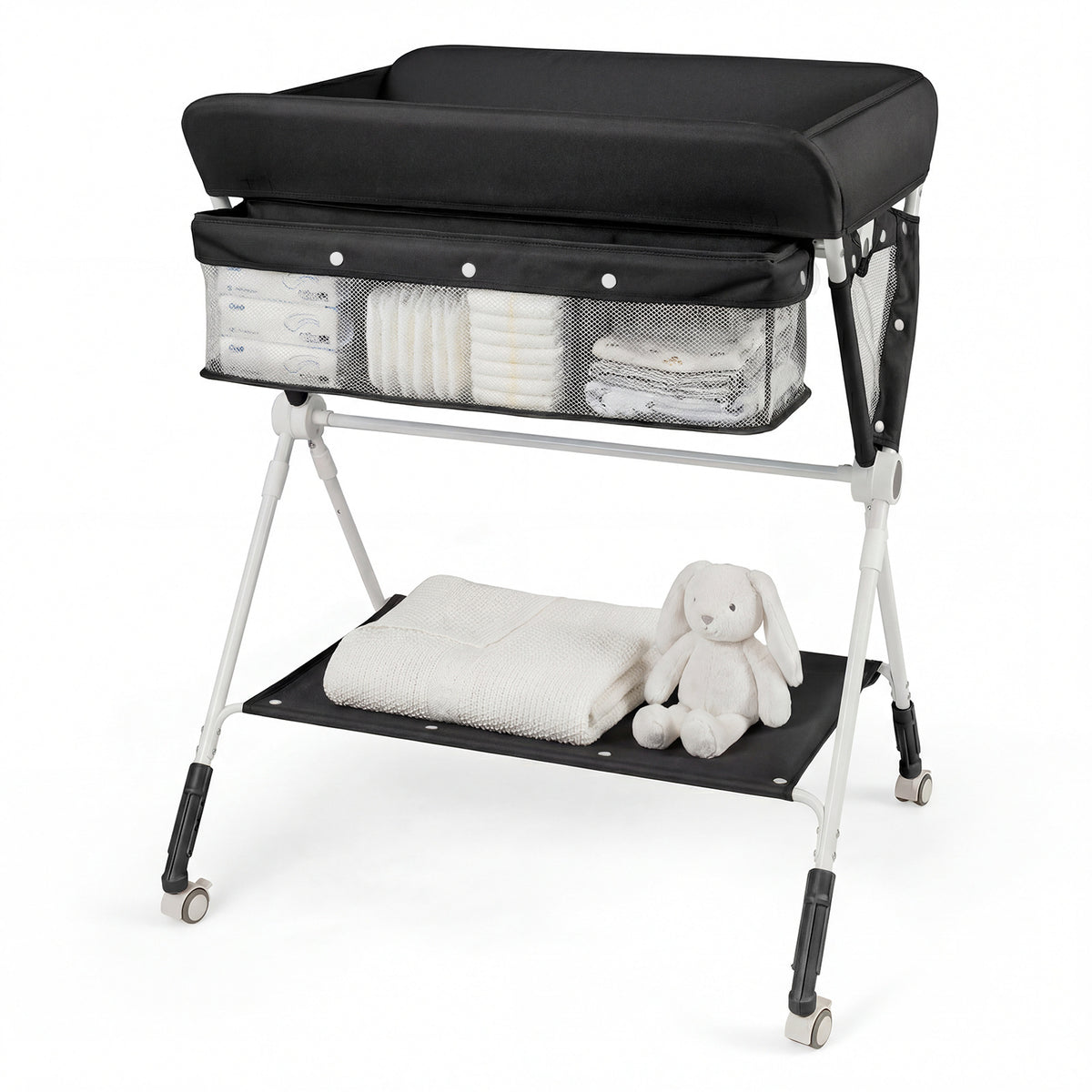 Black changing table with baby supplies and a stuffed bunny