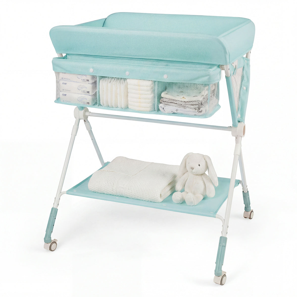 The changing table featuring a storage shelf with a blanket and a toy on it