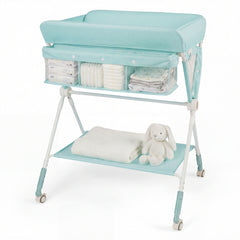 The changing table featuring a storage shelf with a blanket and a toy on it