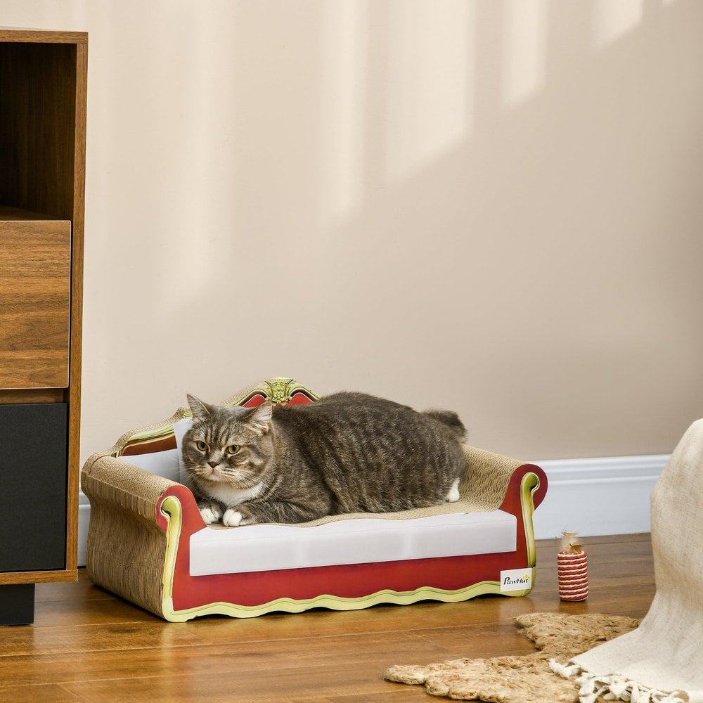 A tabby cat lounges on the cardboard cat scratcher sofa bed in a room