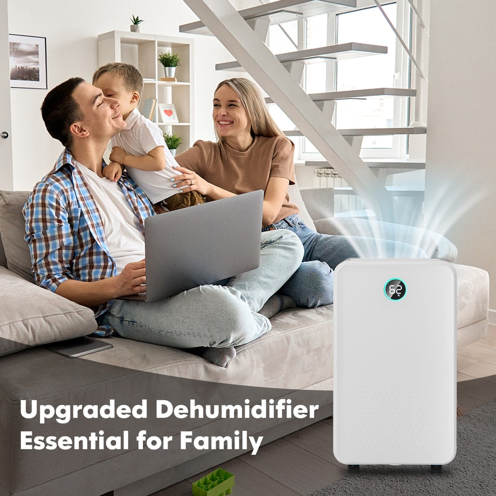 The white dehumidifier standing in a living room next to a family sitting on a sofa