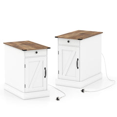 Two white nightstands with wood tops and charging stations, showing power cords