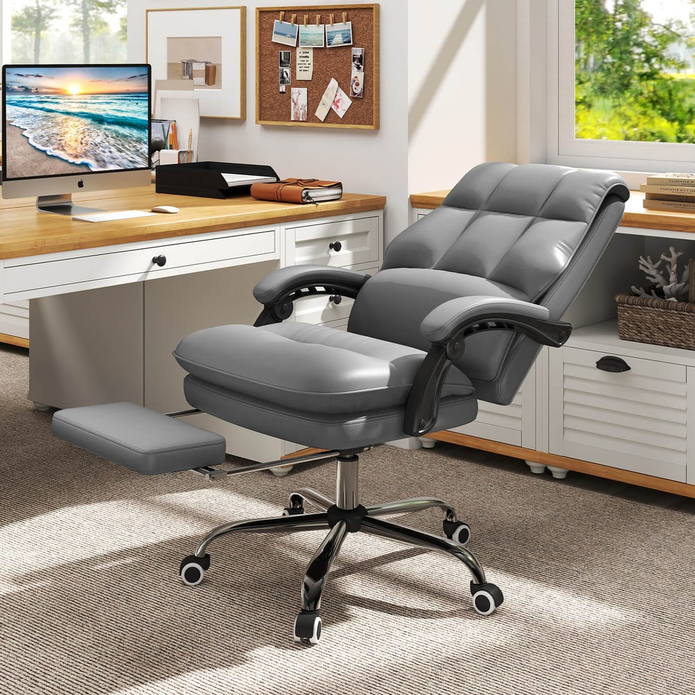 The grey office chair with its footrest extended in a home office setting