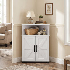The white corner cabinet placed in a living room corner with a lamp and books on top