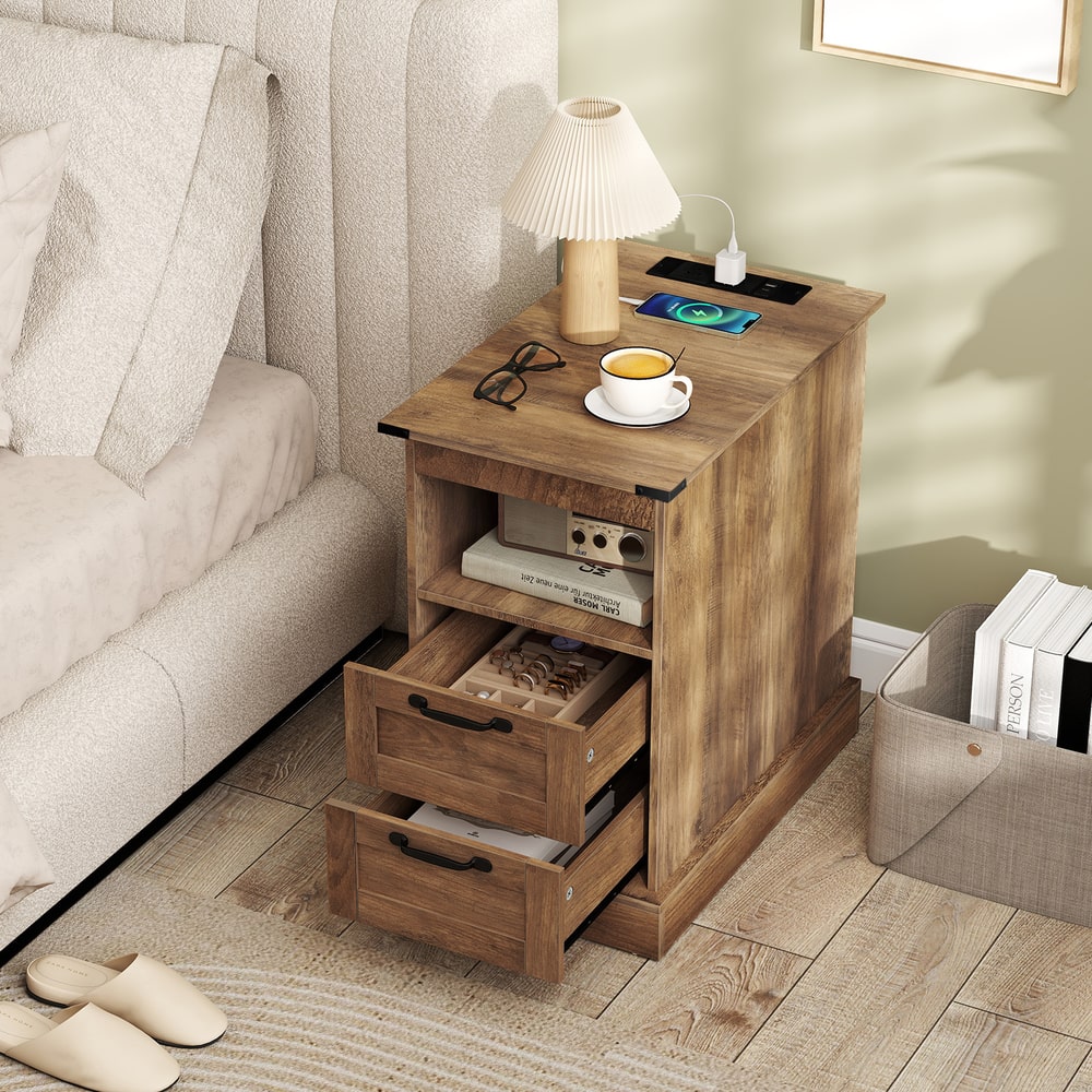 The rustic brown nightstand with open drawers showing storage and charging port
