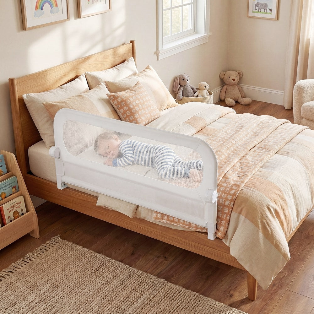 The bed rail attached to a wooden bed with a toddler sleeping safely inside
