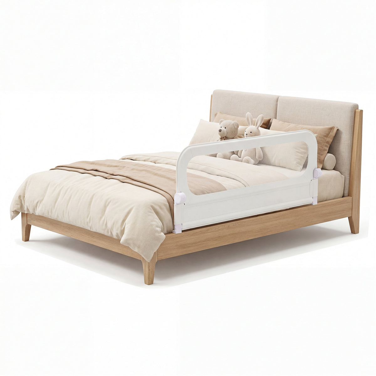 The bed rail fitted to a wooden bed frame with soft toys resting on the mattress
