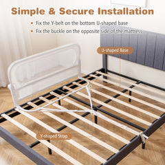 The bed rail showing the strap and base mechanism for securing to a bed frame