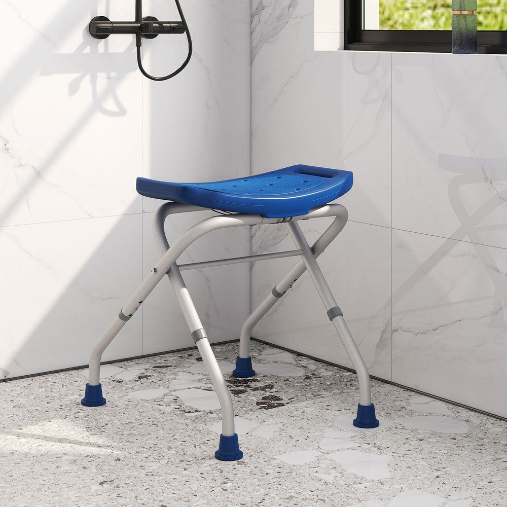 The blue bath safety seat is positioned in a tiled shower cubicle
