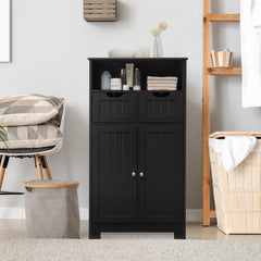 The utility cabinet placed in a bright bathroom setting next to a laundry basket and chair
