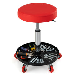 Close up of the red mechanic stool showing the storage tray filled with tools
