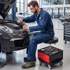Mechanic using the rolling stool to work on a car engine