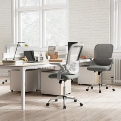 The office chair shown from the back and side in a modern open plan office