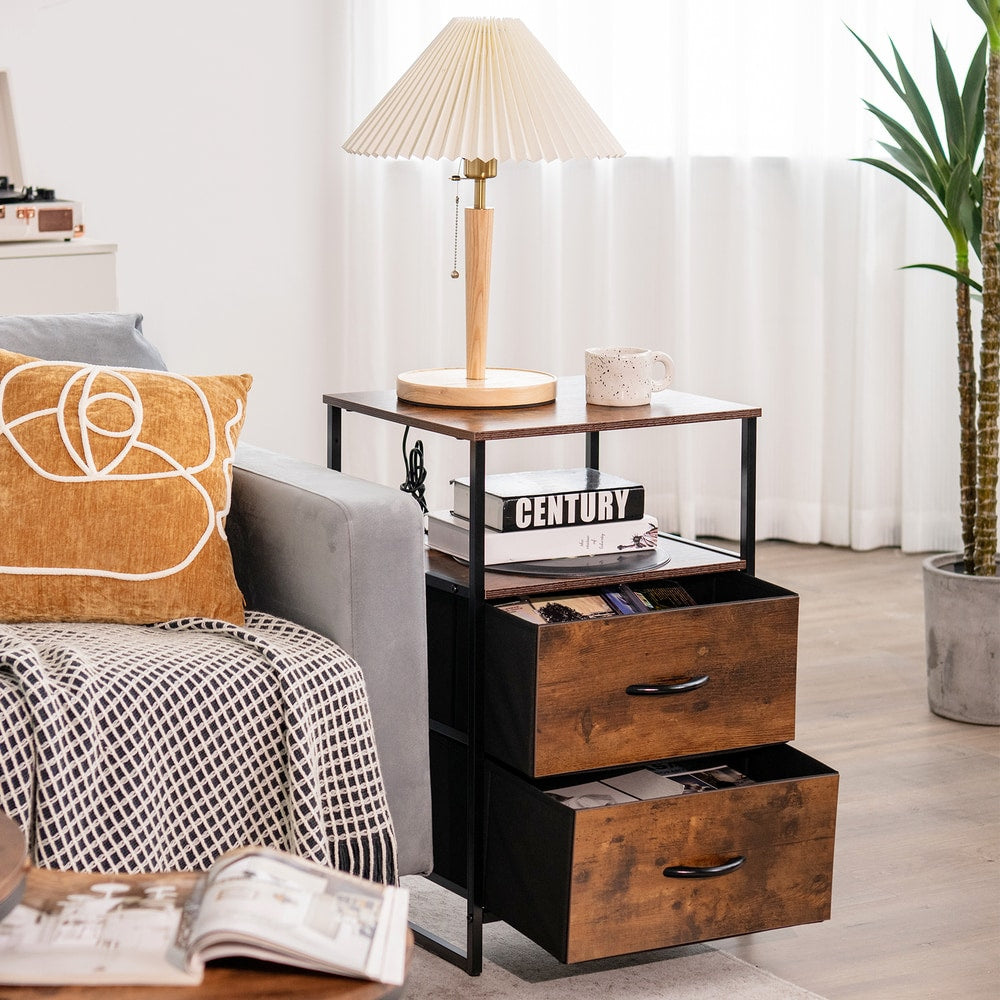 The metal frame storage cabinet with two drawers placed next to a sofa in a living room