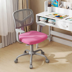 The pink kids desk chair sits in front of a white desk with books