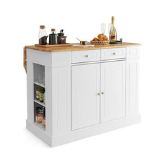 The white kitchen island with a wooden drop-leaf countertop and storage shelves