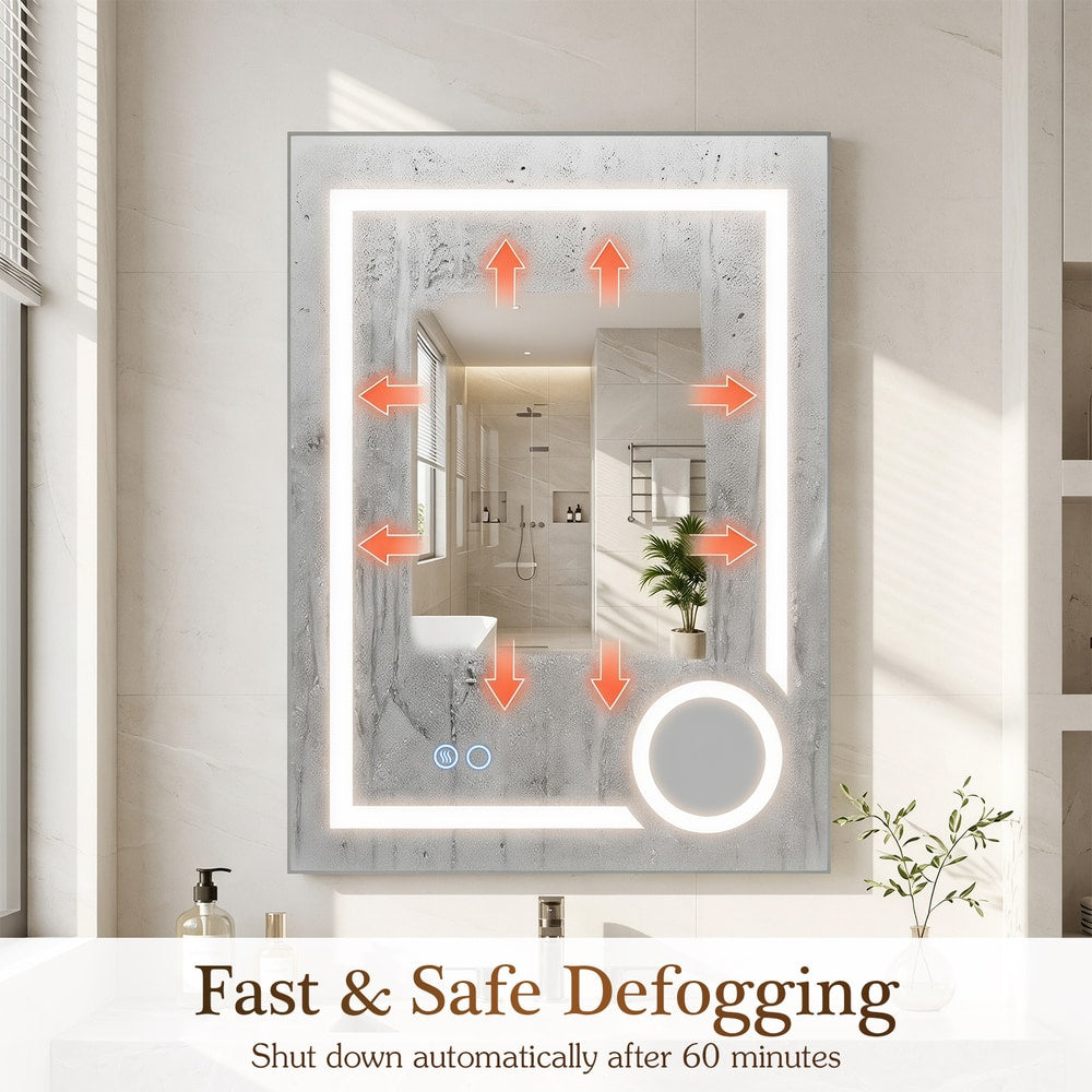 The bathroom mirror showing the anti-fog feature with arrows indicating heat spread