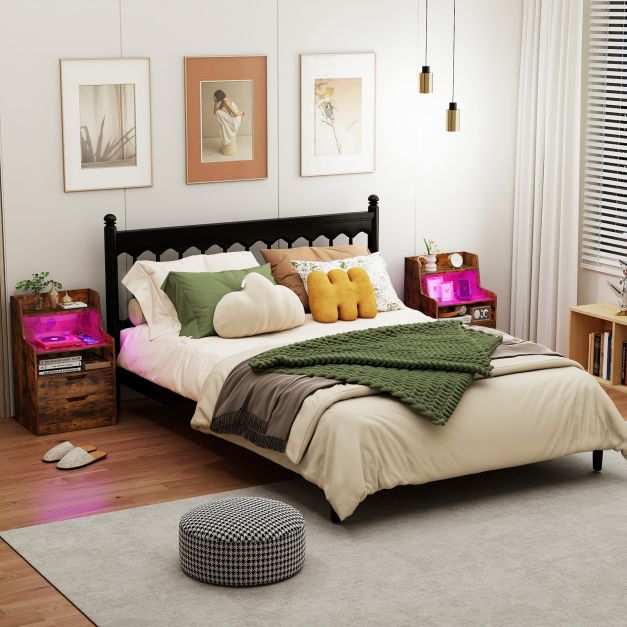 Two rustic brown nightstands in a bedroom setting next to a bed, one with RGB LED lighting