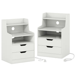 The white bedside tables shown from the back to reveal the power cables and open shelves