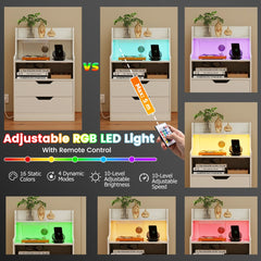 The bedside tables showing various colour options for the light controlled by a remote