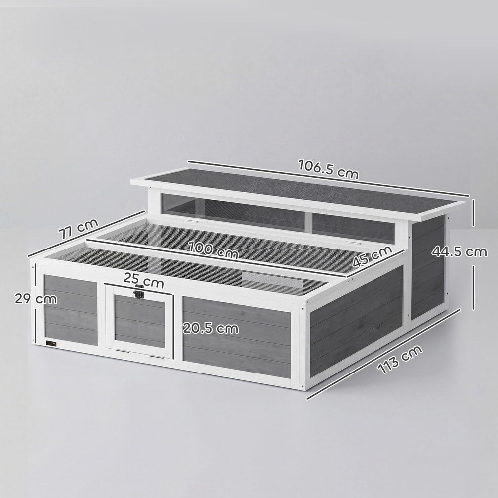 The wooden tortoise enclosure with dimensions shown in white text