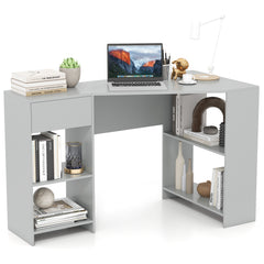 Grey L-shaped computer desk with open shelves and a drawer, laptop on top