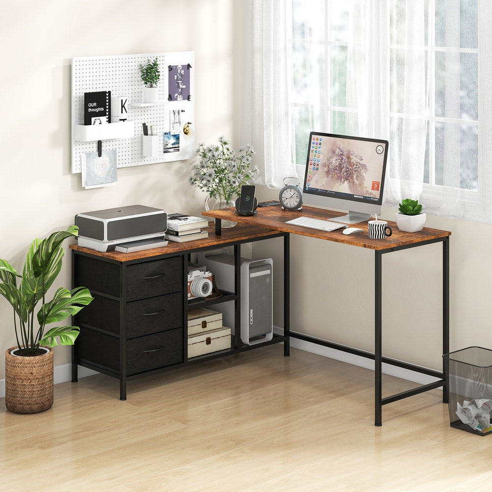 The office desk set up in a bright room with a computer and printer on the rustic brown surface