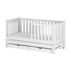The white kids single bed with trundle and storage drawers shown from a three-quarter angle