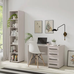 A light grey bookcase filled with books and decorative items in a home office setting