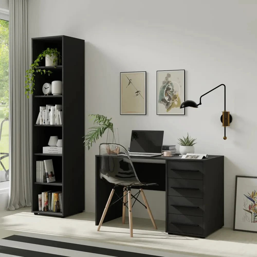 A dark grey bookcase filled with books and decorative items in a home office setting