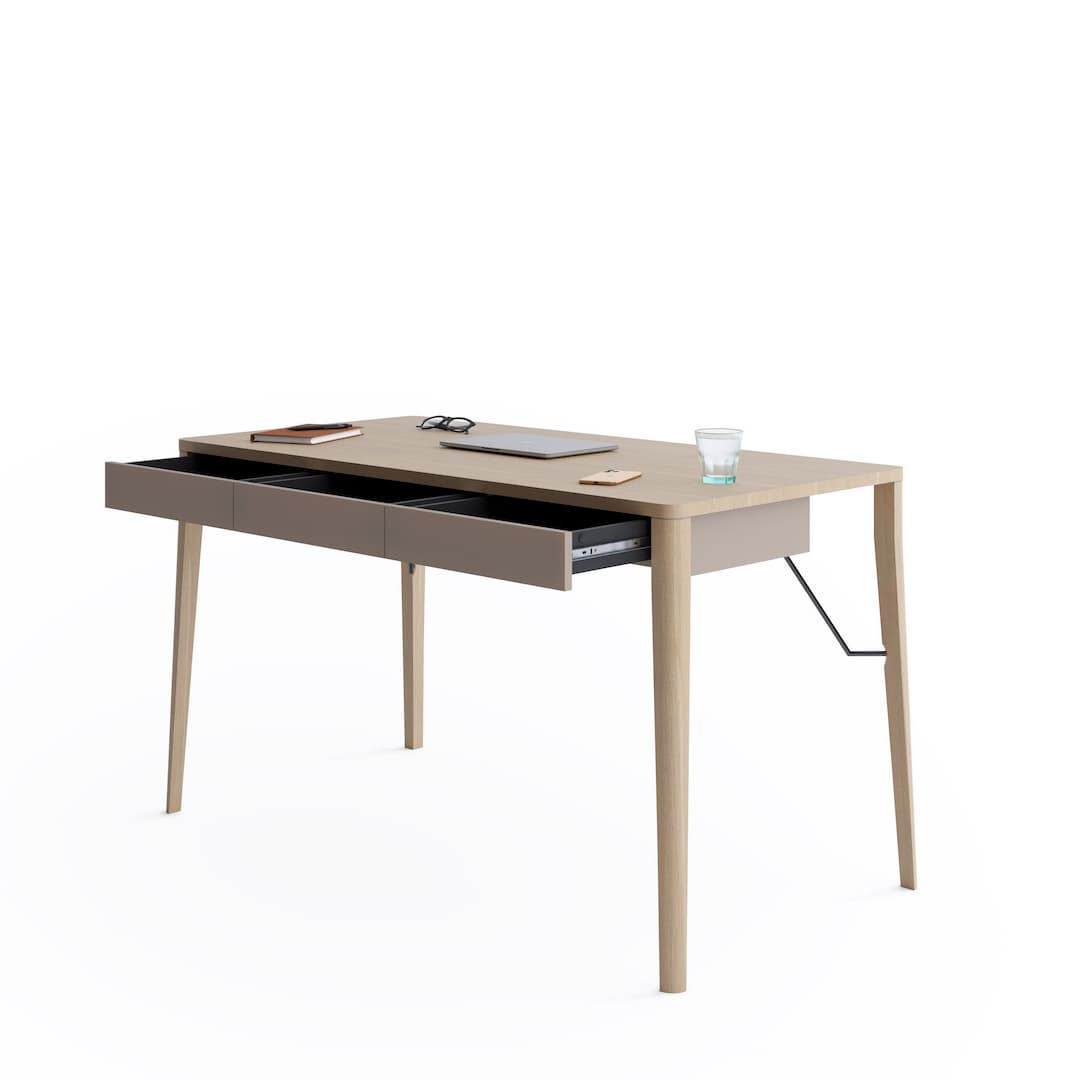 The office desk with the storage drawer pulled open to reveal the interior compartment