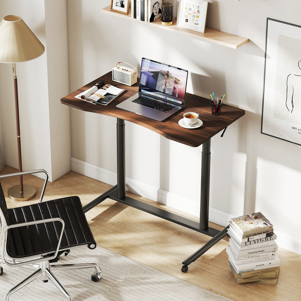 The office desk with a chair and books in a home office setting