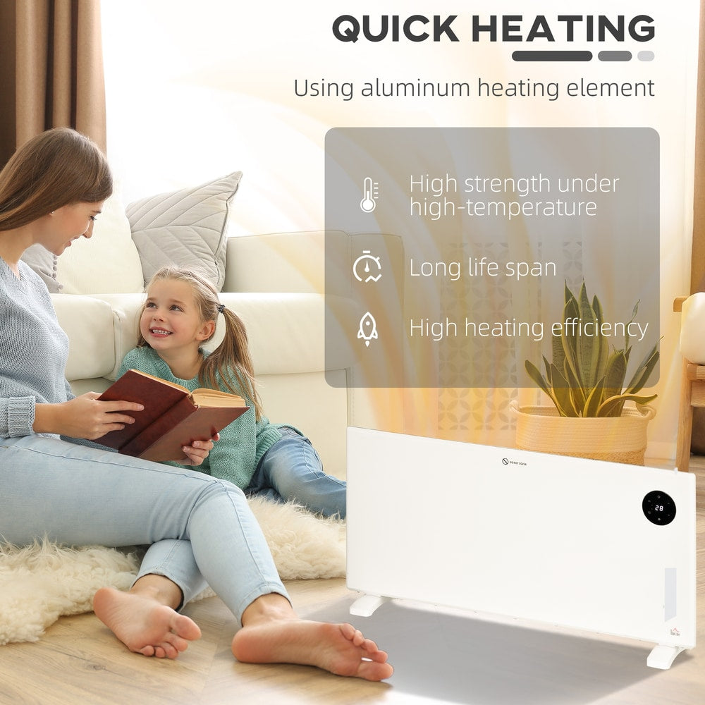 A mother and child sitting on the floor near the electric convector heater