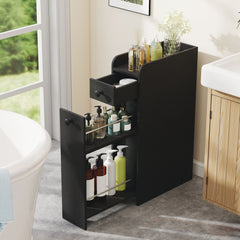 The floor cabinet with the drawer and lower shelf pulled out in a bathroom