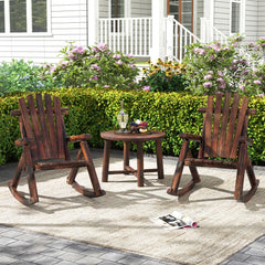 Two wooden Adirondack rocking chairs and a small table set up on a patio