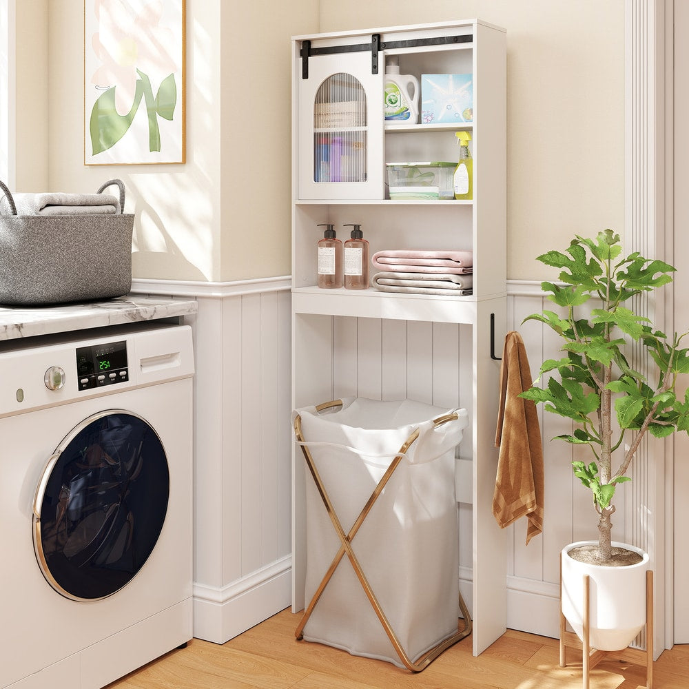 The storage unit placed in a laundry room with a laundry basket tucked underneath the shelf