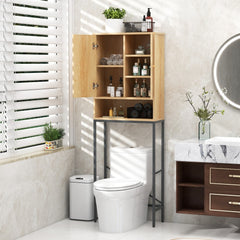 The over the toilet storage cabinet in use, with one door open, showing toiletries and towels stored inside above a toilet