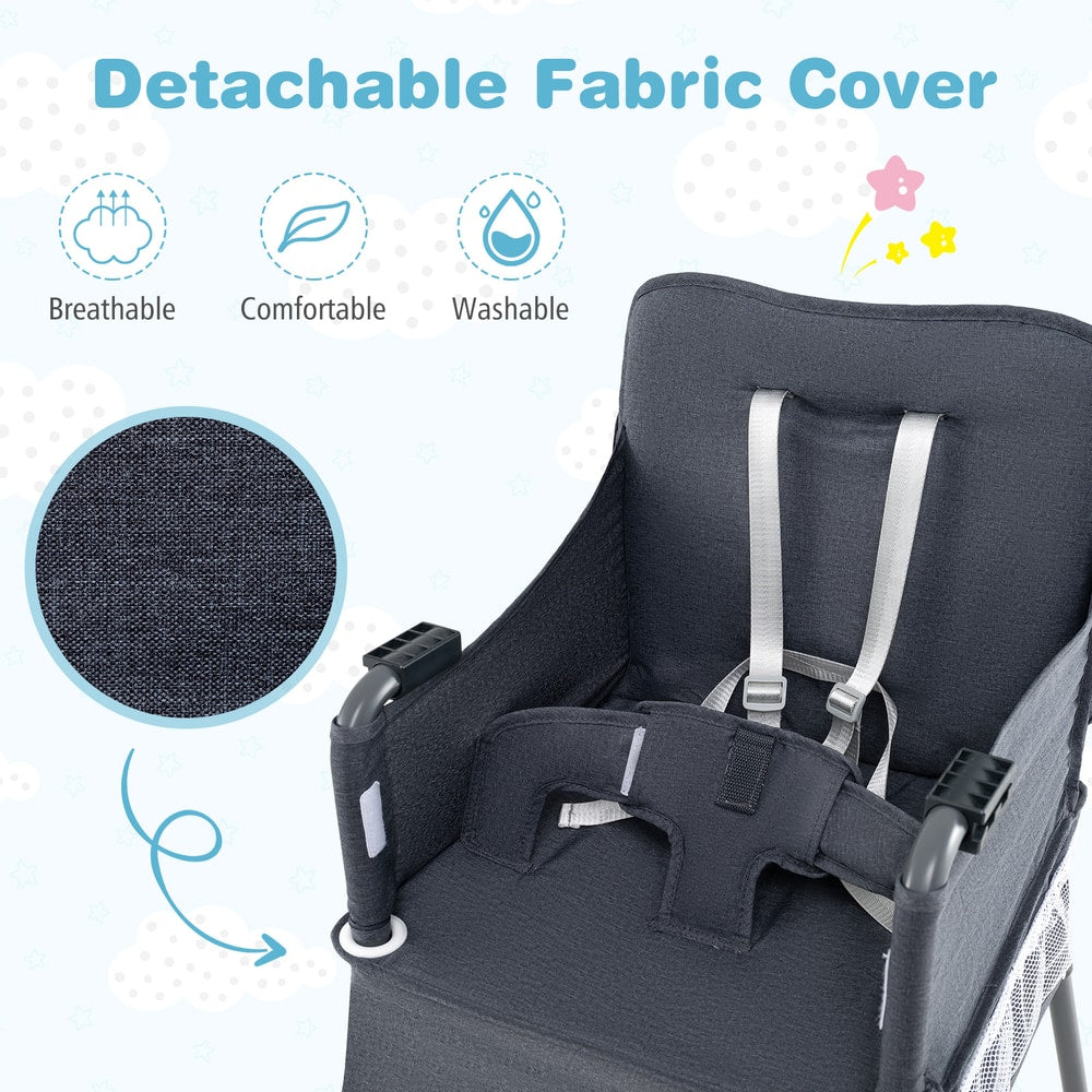 The feeding chair seat showing the harness and the removable grey fabric cover