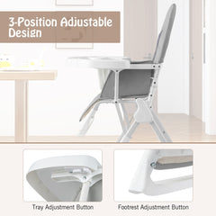 Close-up of the tray and footrest adjustment buttons on the grey portable high chair