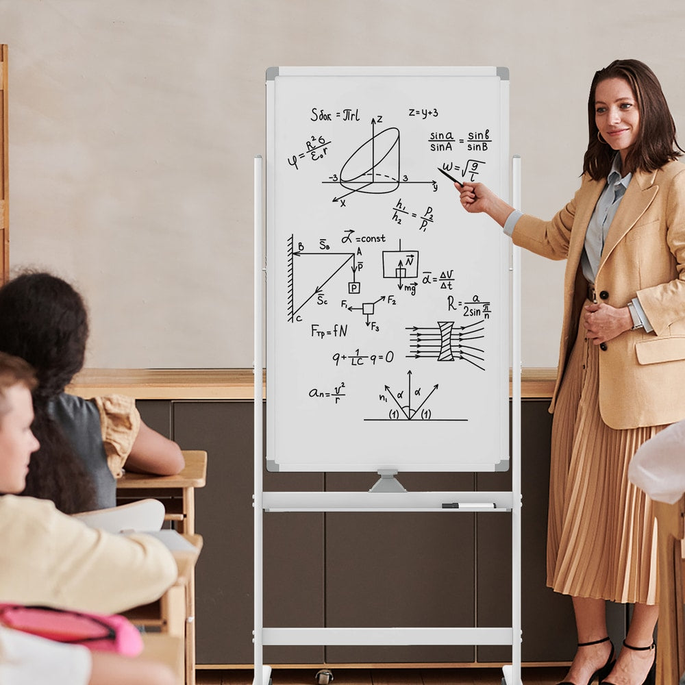 The home office board showing physics equations during a classroom lesson