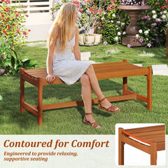 A woman sitting on the outdoor bench in a garden with a close-up of the curved seat edge