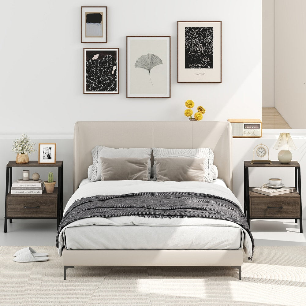 Two grey wood effect nightstands flanking a bed in a bedroom setting