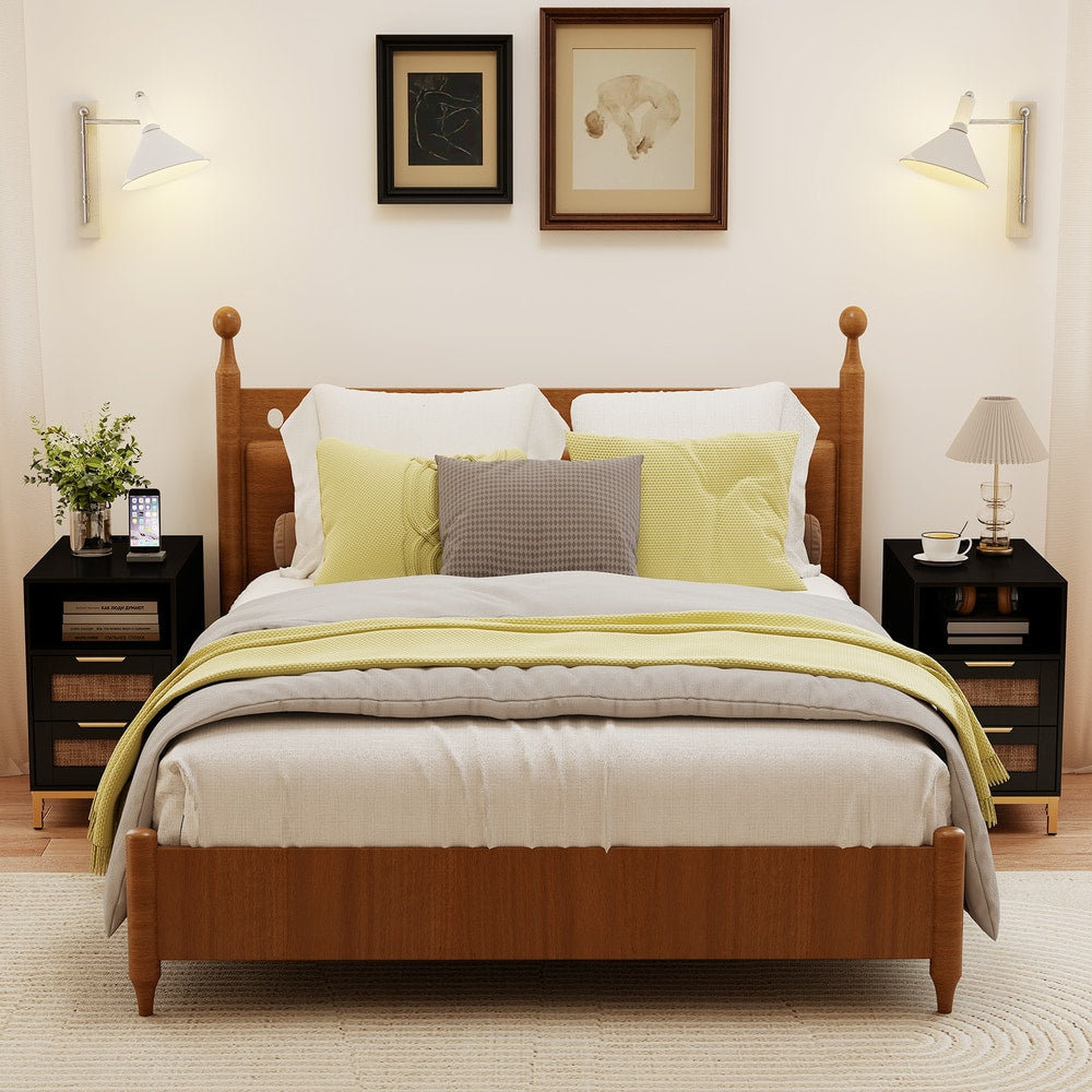 Black narrow end table with rattan drawers in a bedroom setting