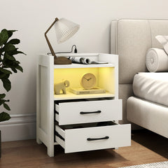 The nightstand with both drawers pulled open to reveal storage space and warm lighting