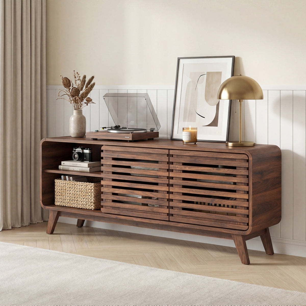 The entertainment center with a record player and books on a shelf