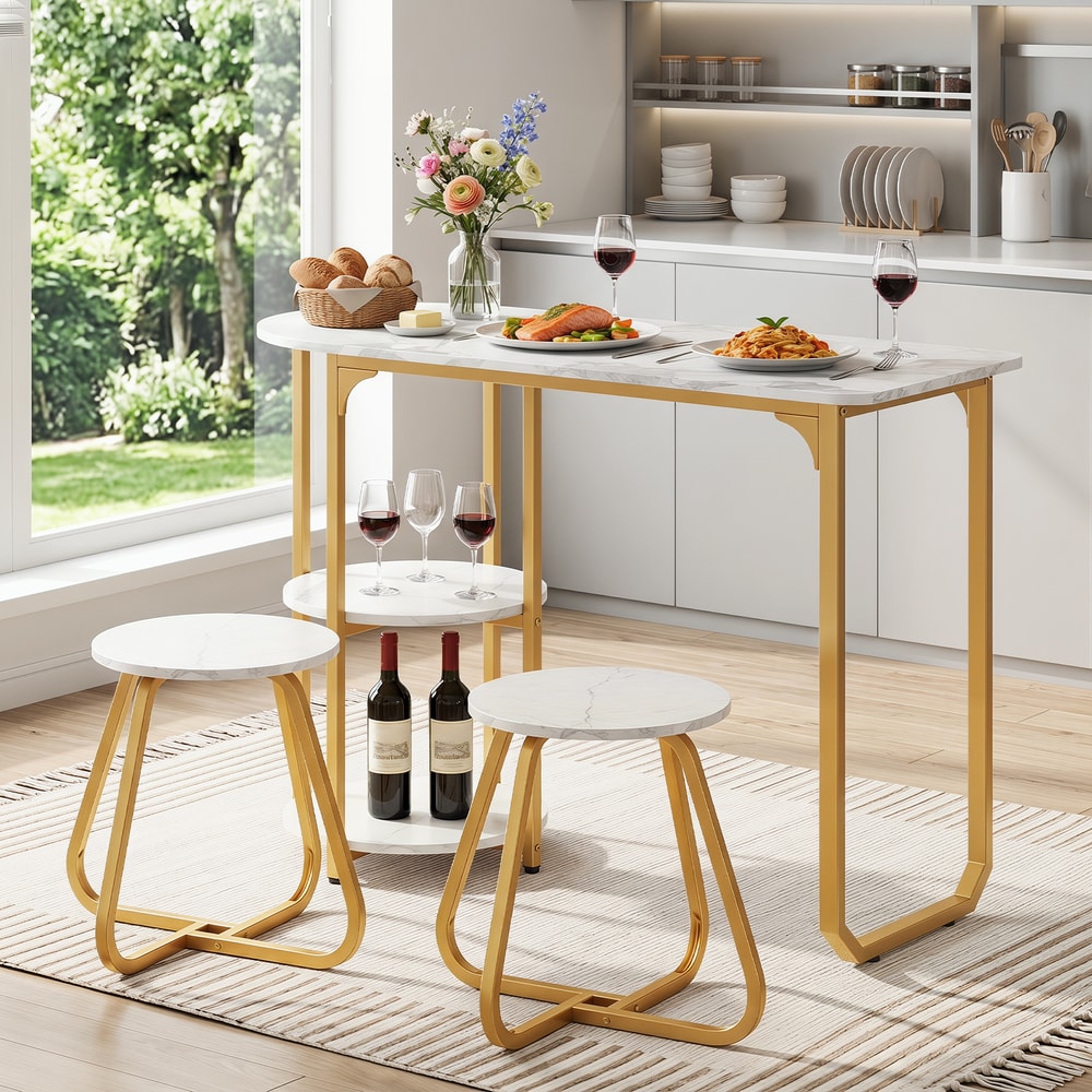The dining room set arranged in a bright kitchen with food and wine glasses on the table surface